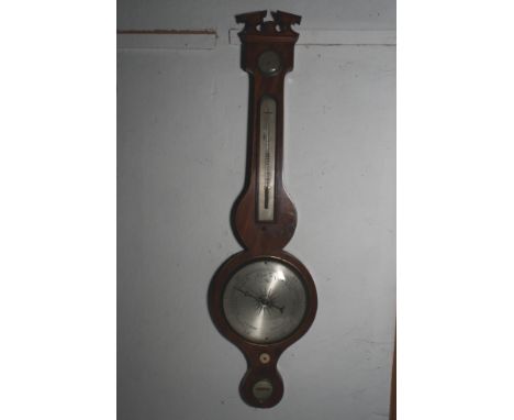 A 19th Century syphon tube barometer in mahogany case with ebony and box edges, broken arch pediment, silvered dial with subs