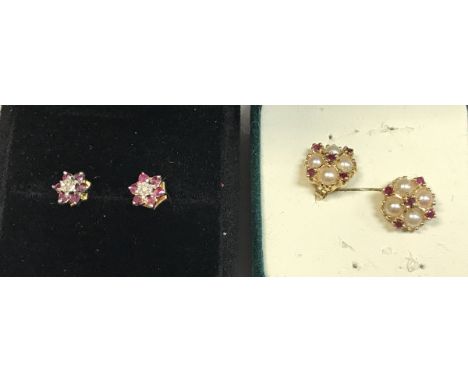 A pair of illusion set diamond and ruby ear studs and a pair of seed pearl and ruby ear studs 