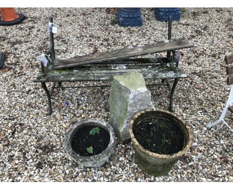 A staddle stone base, two various garden pots and a slatted bench (in pieces)