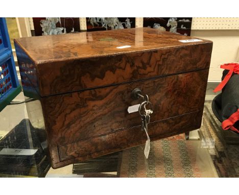A Victorian ladies burr walnut vanity case by Michi &amp; Bazin of London the lid with brass shield inscribed "ASR 1862" open