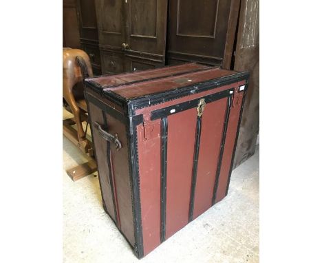 A metal-bound canvas-covered French travel trunk bearing label, brass plaque inscribed "Felix Bellaid"