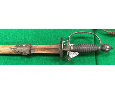 A George III dress sword with hollow triangular section blade indistinctly inscribed, the hilt, handle and grip of white meta
