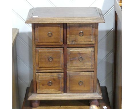 A 19thC mahogany Stool, W 44cm x H 46cm x D 36cm, together with a vintage mahogany six drawer spice chest, W 37cm x H 46cm x 