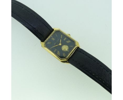 A vintage gold plated Maurice Lacroix Wristwatch, of rectangular form with canted corners, manual wind, black dial with gold 