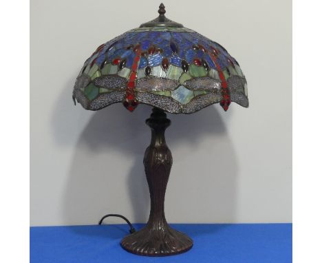 A contemporary Tiffany-style Lamp, the shade of typical style with dragonfly motif, H 56cm. 
