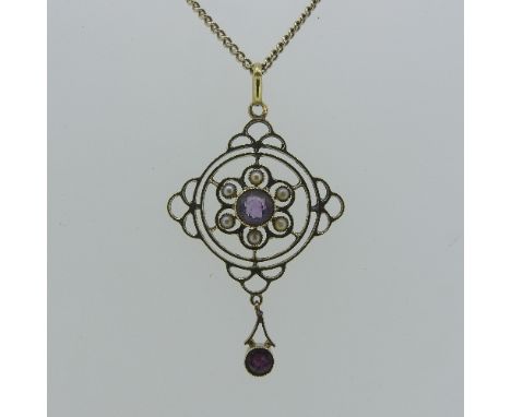 An Art Nouveau openwork Pendant, with facetted amethyst and seed pearl centre, amethyst drop below, all millegrain set, marke