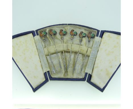A cased set of six early 20thC silver Cocktail Sticks, the finials modelled as cockerels in orange, green and black enamel, m