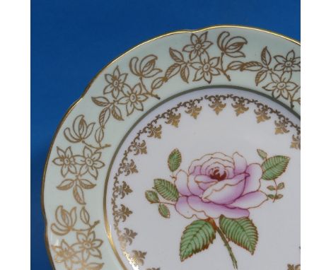 A Spencer Stevenson floral pattern Tea Set, for twelve-place setting, comprising Cups, Saucers, Plates, etc. together with a 