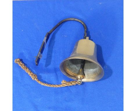 An early 20thC brass Ship's Bell&nbsp;on iron bracket. H 15cm x Diameter 15cm. 