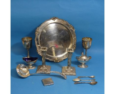 A quantity of Silver Plate, including a pair of early 20thC Corinthian column candlesticks, a salver, cruets, ladle, goblets,