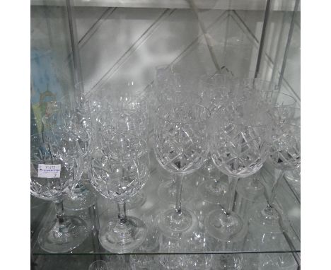 A large quantity of Glassware, to include Decanters, Flutes, Wine Glasses, Tumblers, etc. some Stuart examples, approximately