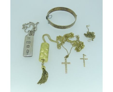 Two 9ct yellow gold Cross Pendants and Chains, 7g, together with a silver ingot pendant, Birmingham 1977, 1ozt, a gold plated