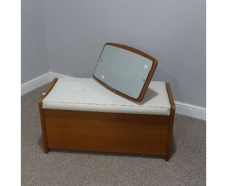 A retro teak framed Wall Mirror, together with a vintage Ottoman, with white vinyl seat, W 87cm x H 43cm x D 41 cm (2) 