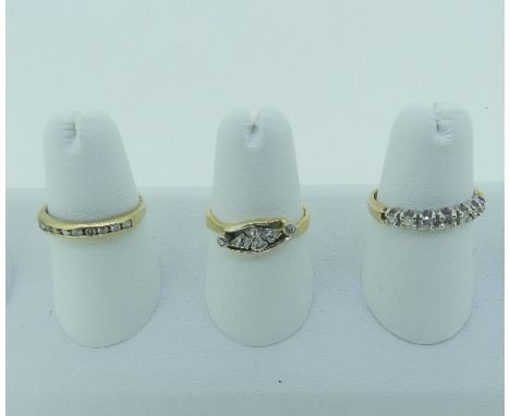 A small seven stone diamond Half Eternity Ring, mounted in 9ct yellow and white gold, Size M½, approx total weight 2.3g, toge