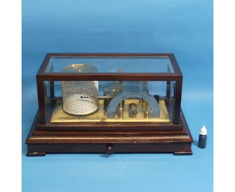 An early 20thC Negretti and Zambra "Regent" Barograph, jewlled movement serial number R/ 46382, under a mahogany frame with b