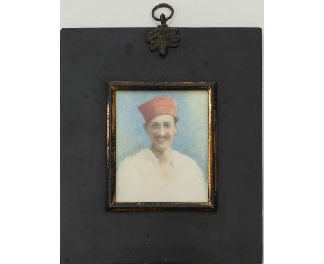 English School (late 19th century): a portrait miniature of a young Moroccan gentleman - wearing a fez, watercolour on ivory,