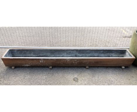 An unusual large lead-lined teak conservatory or glasshouse trough or planter - probably mid-20th century and possibly origin