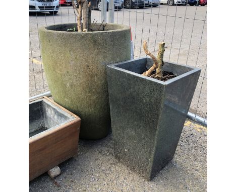 A square tapered granite garden planter - 30 x 30 x 49cm high; together with a cement planter of tapered circular form, 46cm 