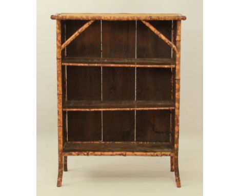 A 1920s bamboo three-shelf open bookcase &ndash; with rattan top, (LWH 79 x 31 x 103.5 cm).