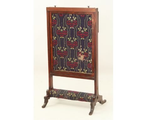 A late-Regency mahogany rise-and-fall fire screen &ndash; the rectangular screen with later Arts &amp; Crafts style woolwork 