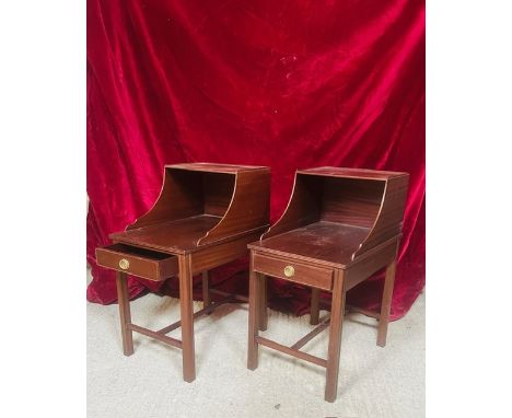 A pair of American style mahogany bedside tables - late 20th century in the 19th century style, with a shallow upper shelf on
