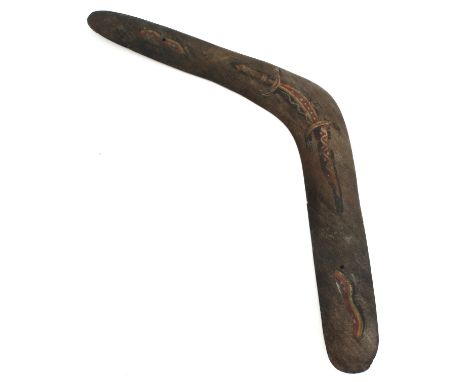 An old boomerang with painted aboriginal artwork - 46.5cm long, old crack and glued repair to one end, has been drilled for h