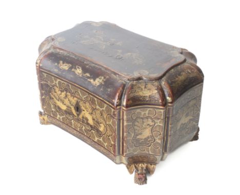 A&nbsp;Chinese export lacquer tea caddy, early 19th century - shaped form, with carved lion mask feet, the exterior painted i