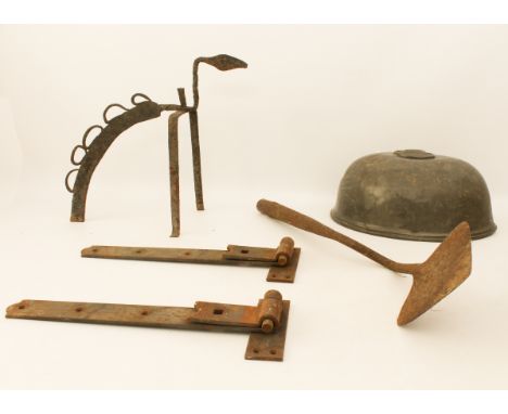 Five pieces of metalware: a pair of heavy door or gate hinges (46.5 x 16 cm); an unusual fireside piece 41cm high a pewter do