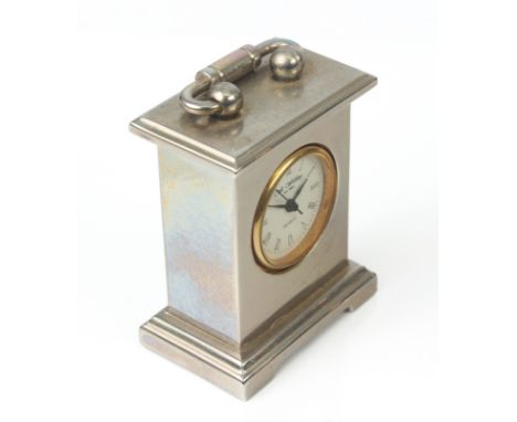 A miniature silver plated bedside or desk mantel clock - modern, the Roman dial signed 'Wm Widdop', with quartz movement, 5.1
