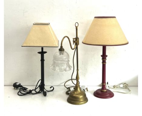 Three table lamps - comprising an Edwardian style brass reading lamp with etched glass shade, 52cm high (brass tarnished); a 