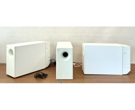 A Bose Acoustimass 20 speaker system - comprising three Powered Subwoofers (two with power leads) and six wall mounted mini c