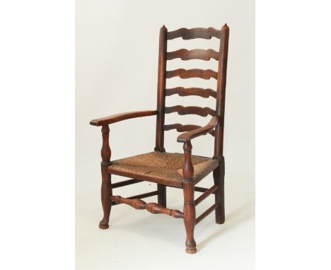 An early 19th&nbsp;century ash and elm ladder back open armchair - the ladder back with six shaped rails on turned uprights, 
