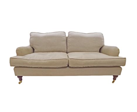 Good quality Howard type three/two and a half seater sofa, with neutral linen upholstery, 75" long x 39" deep (some fading to