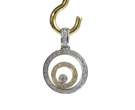 (112 607160555-c) 18k diamond set two colour floating diamond pendant in the style of Chopard, 4.6gm, 23mm x 16mm