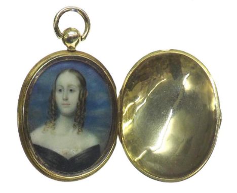 19th century oval gold engine turned locket pendant, inset with an oval miniature on ivory depicting a portrait of a young la