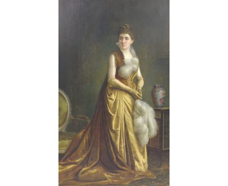 T**Protheroe (19th/20th century) - portrait of a fashionable lady, standing full length wearing a gold coloured gown, holding