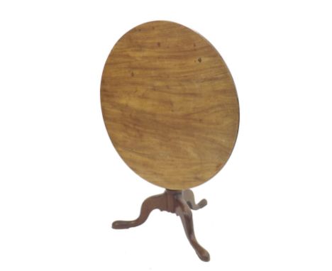 19th century mahogany tripod table, the single piece top upon a wrythen half fluted baluster column, 37" diameter x 29" high