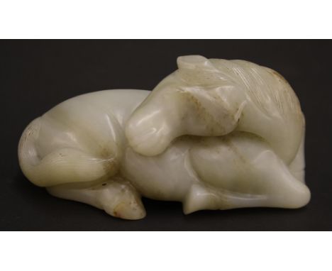 Qing dynasty celadon and russet jade carving of a horse, 4.5" long x 2.25" high