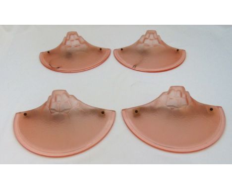 A set of four Art Deco fan shape pink glass wall lights, with metal mounts