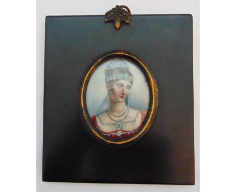 A framed oval portrait miniature of a lady wearing a tiara and twin pearl necklace, image 6.5 x 5.5cm frame 14 x 12cm