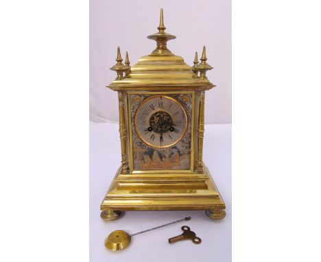 A late 19th century French mantle clock, the rectangular brass case with metal dial and Roman numerals inset with chinoiserie