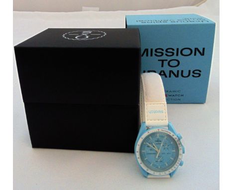 Omega Swatch Bioceramic Moon Swatch Collection Speedmaster chronograph, Mission to Uranus edition, pastel blue dial, three su