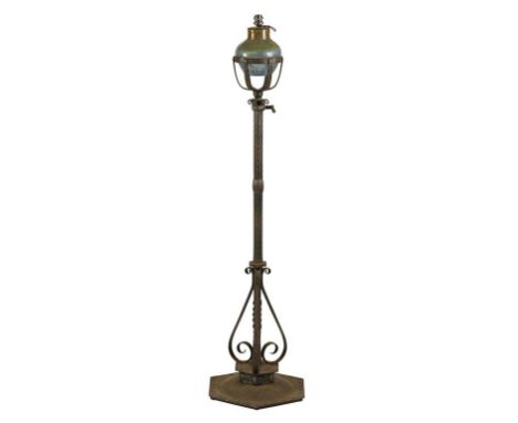 IN THE MANNER OF EDWARD SPENCER FOR ARTIFICERS GUILD: AN ARTS AND CRAFTS IRONWORK LAMP, the Monart glass bowl decorated in to