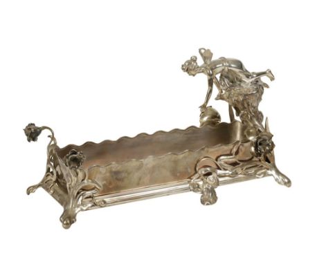 WMF: AN ART NOUVEAU PEWTER TABLE CENTREPIECE, rectangular form, the silver plated liner with wavy border, surmounted with a k