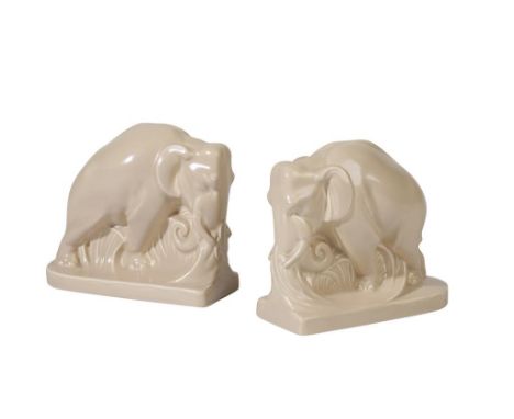 POOLE POTTERY CARTER STABLER ADAMS CERAMIC BOOKENDS, modelled as a pair of elephants, designed by Harry Brown, impressed mark