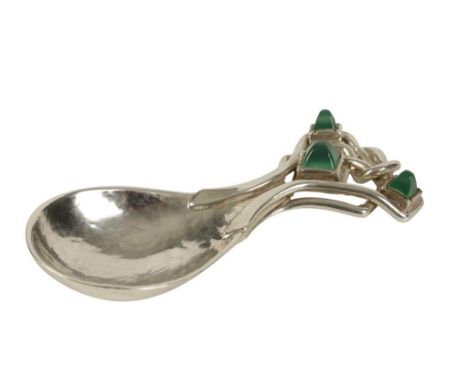 OMAR RAMSDEN (1873-1939): A SILVER CADDY SPOON, London 1917, the spot hammered fig-shaped bowl with openwork stylised handle 