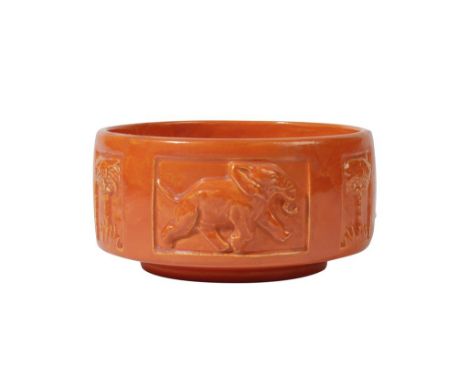POOLE POTTERY CARTER STABLER ADAMS "ELEPHANT" BOWL, circular form, decorated with elephants and palms in relief, probably des