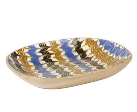 POOLE POTTERY TRADITIONAL DISH, oval form with raised borders, slip trailed and combed decoration in tones of brown, oranges 