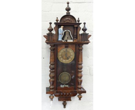 A WALNUT 'VIENNA' CLOCK WITH AUTOMATON, THE BELL STRUCK BY THE PAINTED PLASTER FIGURE OF FATHER TIME, IN PEDIMENTED CASE WITH