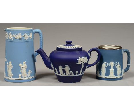 A DUDSON BROTHERS DARK BLUE JASPER DIP TEAPOT AND COVER, A WEDGWOOD&nbsp;SILVER MOUNTED BLUE JASPER DIP NATIONAL RIFLE ASSOCI